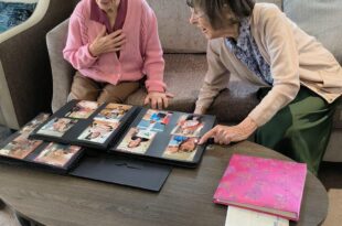 Avocet House reminisce over scrapbook