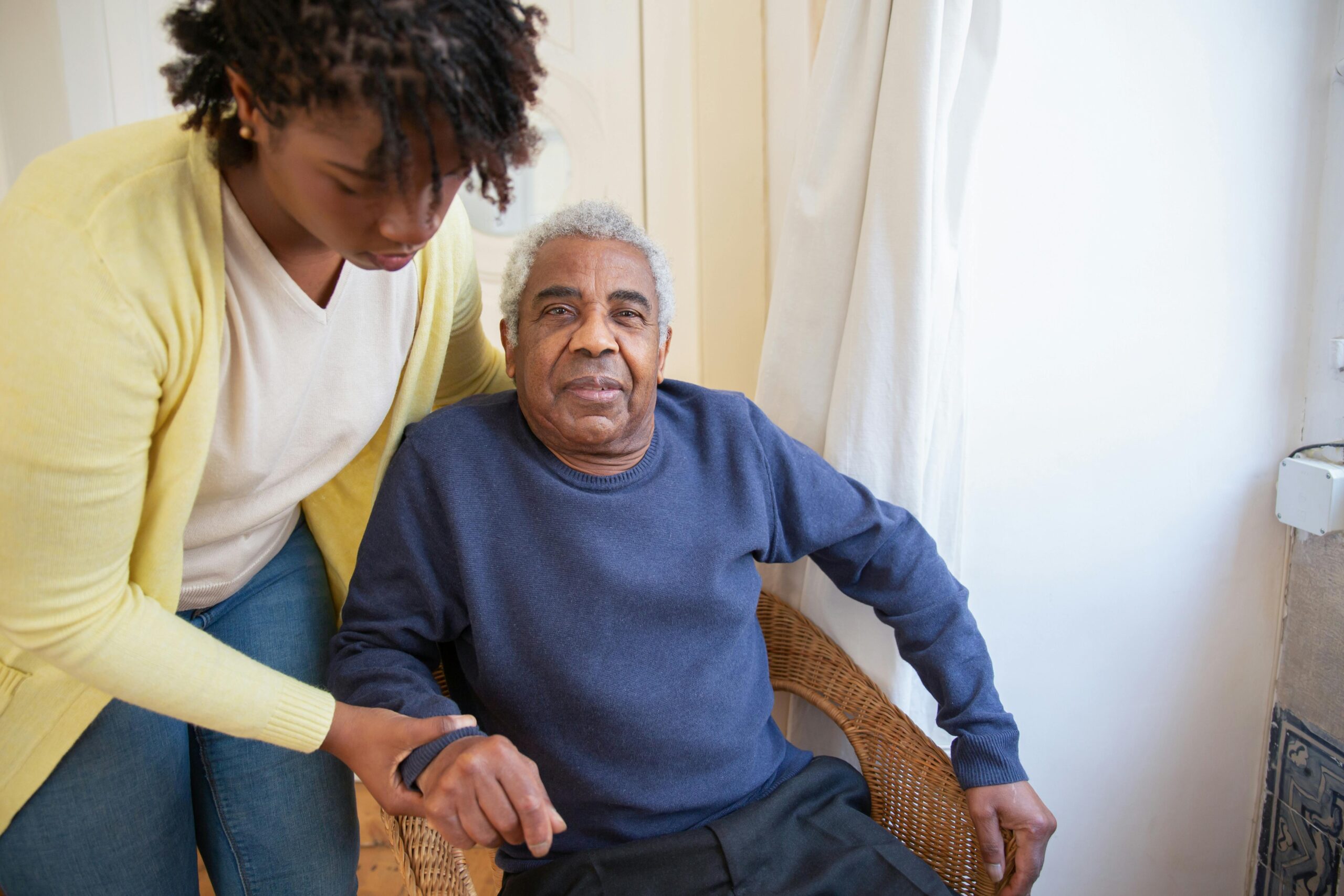 Caregiver offering care to a care recipient in-home .